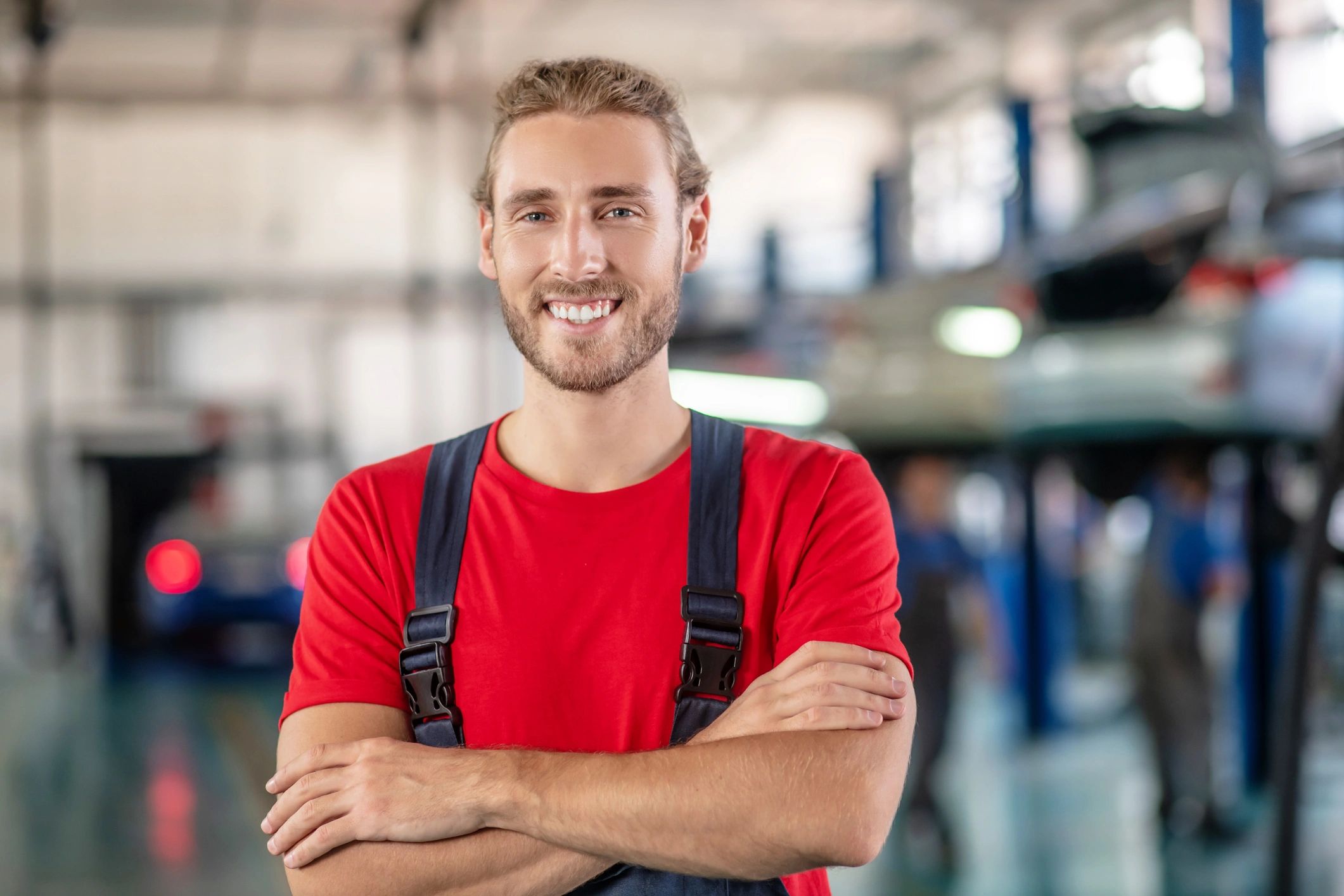 Portrait of a friendly auto shop team member