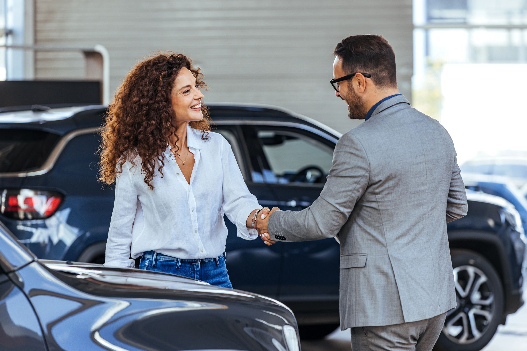 Customer in a car showroom